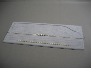 Tray to string pearl necklaces