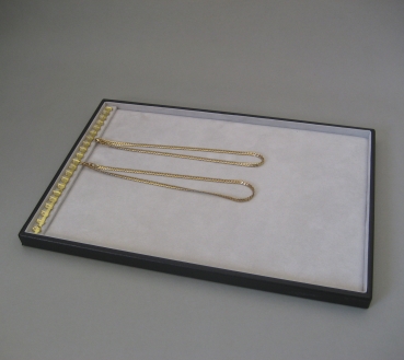 Tray for chains - strip of hooks across